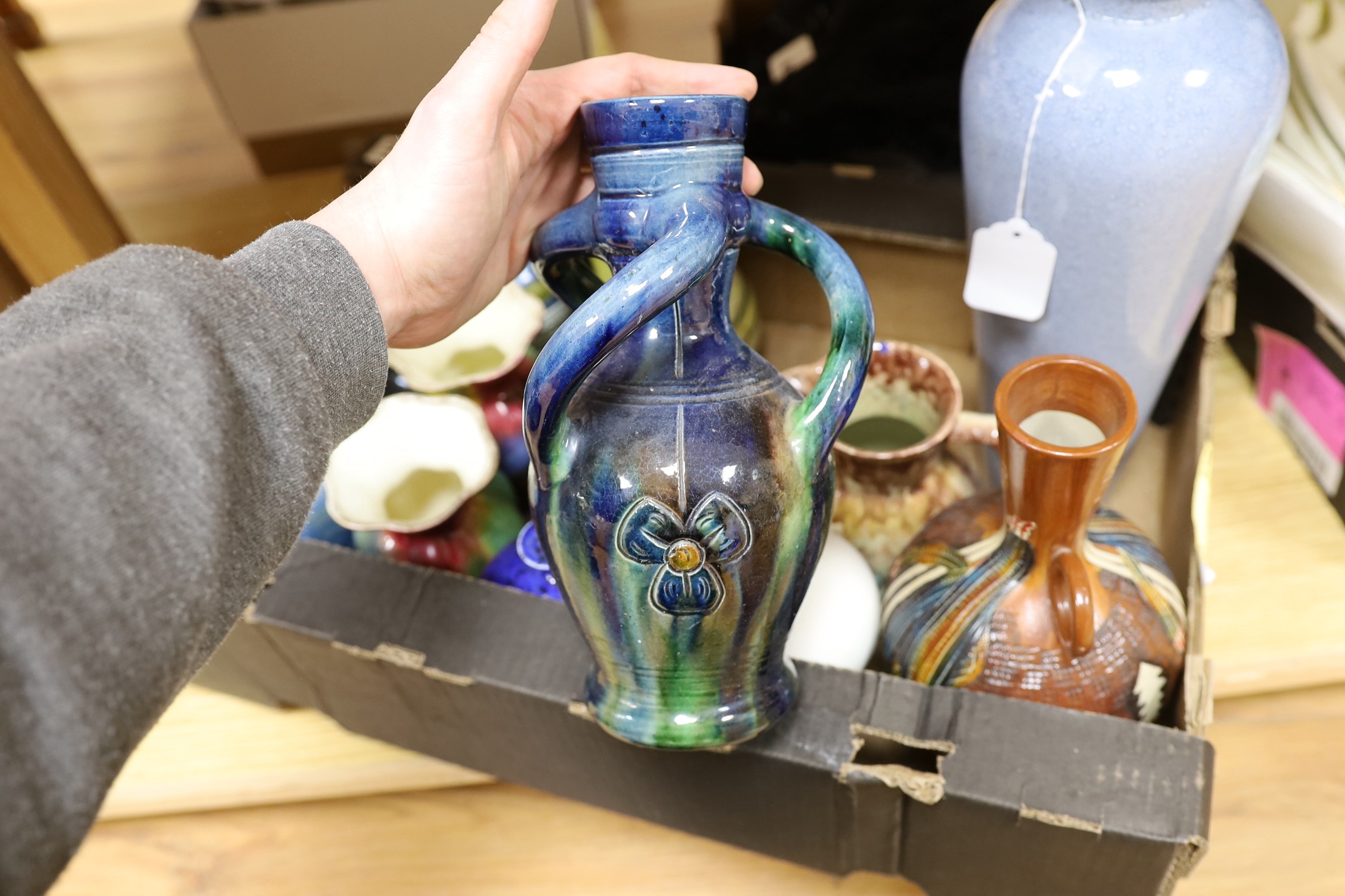 A collection of mixed continental pottery vases
